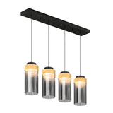 A modern ceiling light fixture with four cylindrical pendant lights, each featuring a wood accent and clear glass shade, hanging from a rectangular black base.