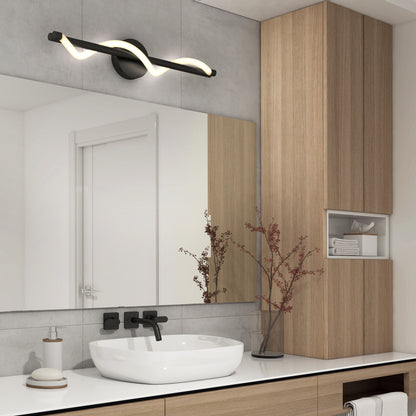 Modern bathroom with a large mirror, white vessel sink, black faucet, soap dispenser, and minimalist decor. Light wood cabinets and an Artika Neon modern LED bathroom vanity light 5 CCT are visible above the mirror.