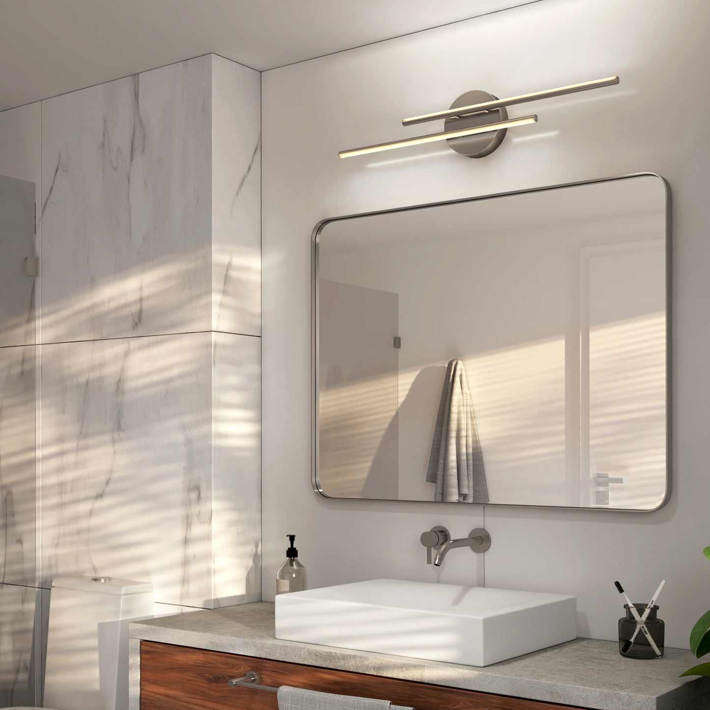 A modern bathroom with a marble wall, white square sink, wooden vanity, and rectangular mirror features the Artika Cisco modern LED bathroom vanity light 5 CCT for adjustable lighting. A towel hangs in the background near this sleek setup.