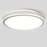 A modern, circular ceiling light fixture with a minimalist design, featuring a bright white center and two thin, illuminated rings on a light grey background.