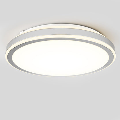 The Artika Altitude 15 in. LED modern flush mount light features a circular, minimalist design and 5 adjustable color temperatures, casting bright white light on a light gray ceiling.