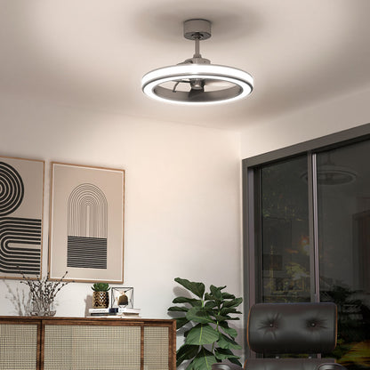 Modern living room with a stylish circular ceiling fan light, abstract wall art, a glass sliding door, a potted plant, a chair, and a wooden sideboard with decorative items.