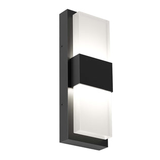 The Artika Mazza Frosted indoor-outdoor LED wall light features a sleek rectangular black metal frame and two frosted glass panels, casting soft up-and-down lighting.