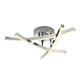 Modern ceiling light fixture with a round chrome base and four curved LED bars intersecting in an abstract, contemporary design. The LED bars emit a soft white light, giving the fixture a stylish, sculptural appearance.