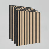 Four rectangular wood acoustic panels with a pattern of vertical light wood and black slats are arranged in a staggered row against a plain, light gray background.