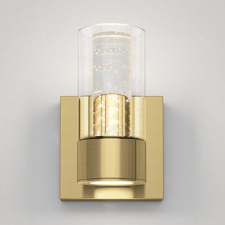 The Artika Essence 1-light LED vanity light features a dimmable design with a cylindrical bubble glass shade and square backplate.