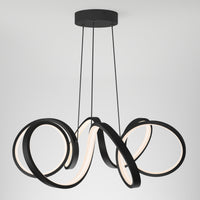 The Artika Swirl Ribbon LED pendant light features three intertwined black LED rings suspended by cords, creating a modern, sculptural look against a plain white background.