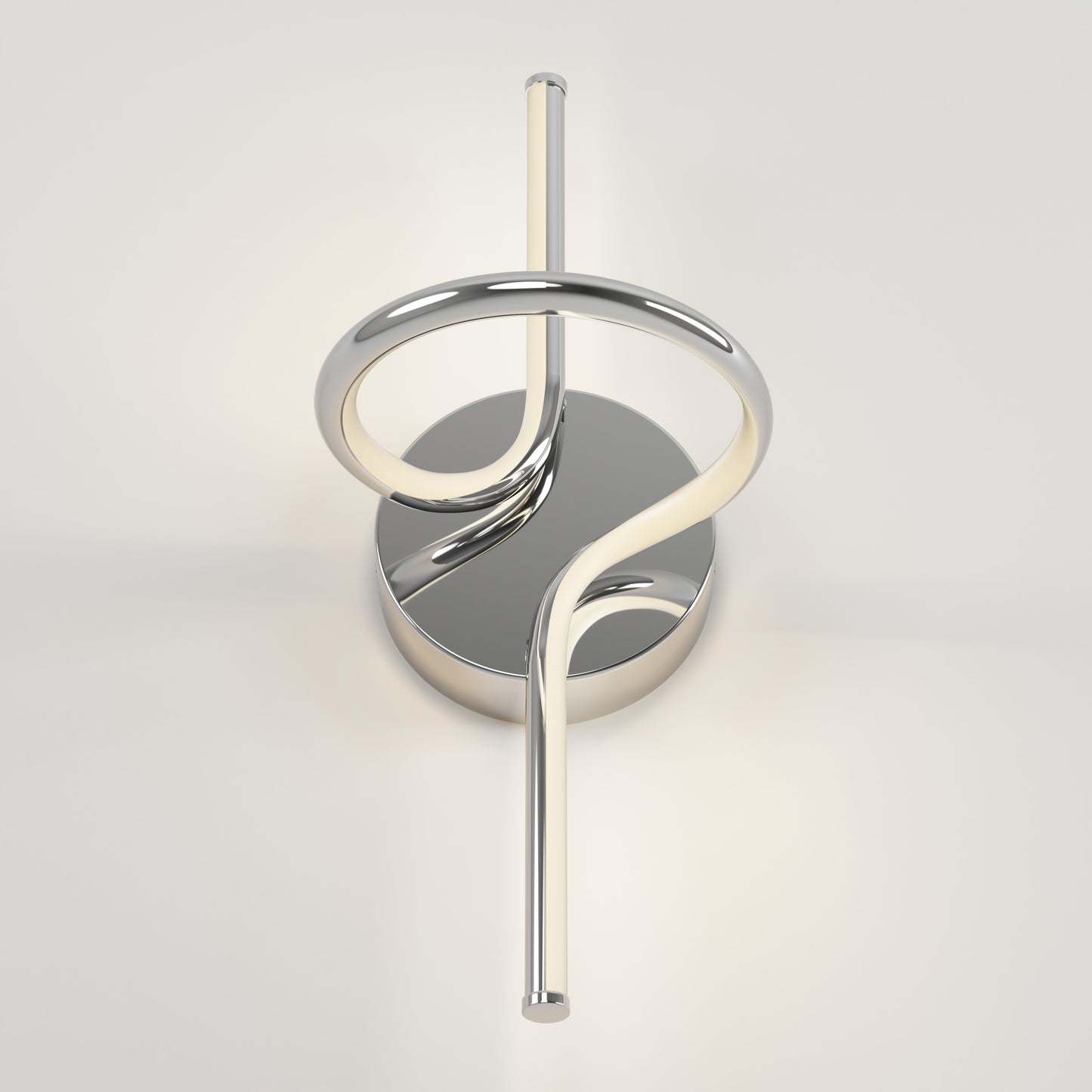 The Artika Swirl LED Sconce features a chrome circular base and an abstract, twisting LED tube for a sculptural, minimalist look—perfect as a modern wall-mounted light fixture.