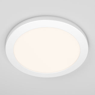 The Artika Europa Disk 9 in. LED modern flush mount light, with selectable 3 CCT, is installed on a smooth, light grey ceiling and emits a soft, even glow.
