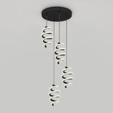 A modern ceiling light fixture with three spiral-shaped LED pendants hanging at different lengths from a round black base against a plain white background.