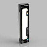 A rectangular black box containing an Artika Europa 36-inch LED light panel is shown standing upright with product details, an image of the remote control, and lighting features visible on the packaging.
