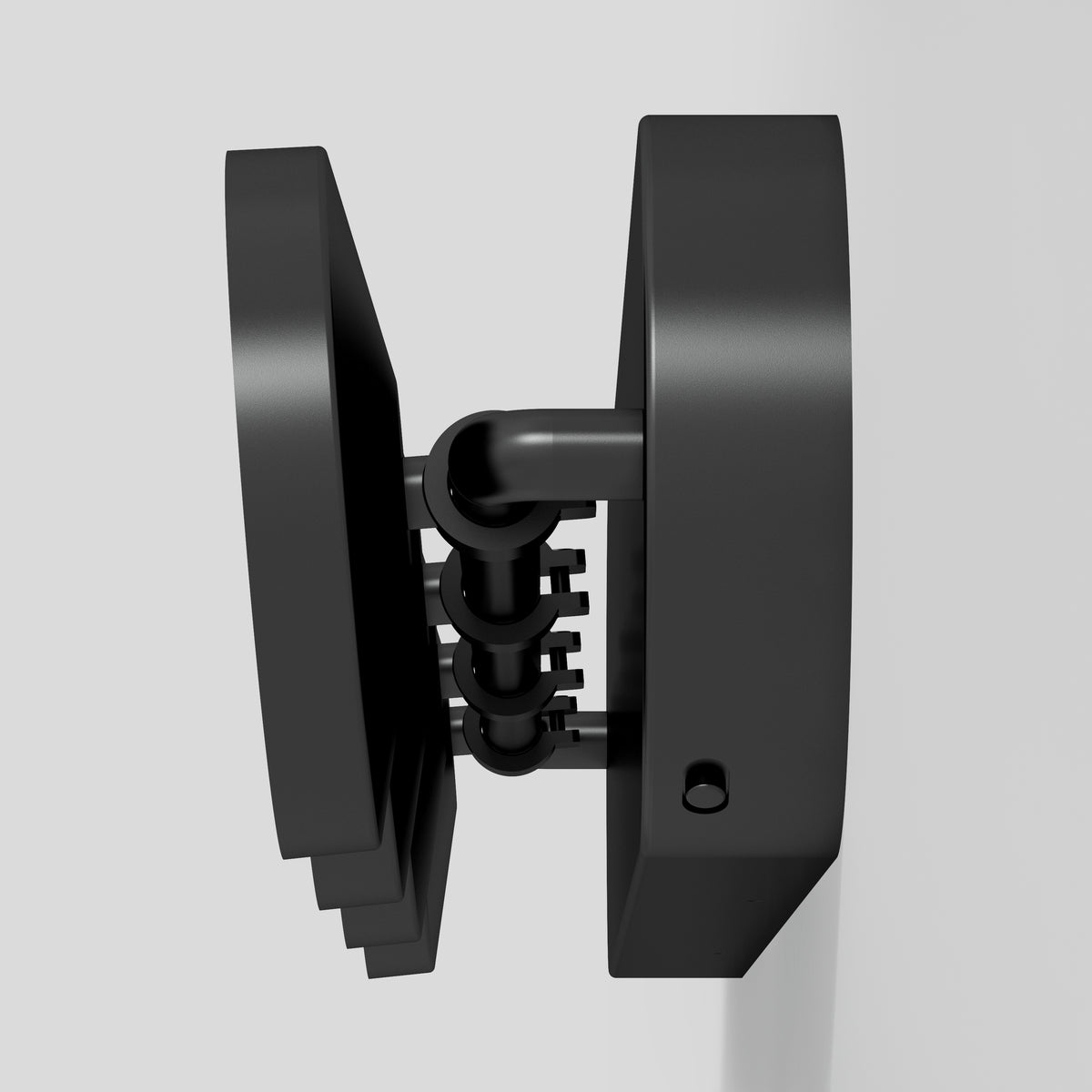 A black, wall-mounted combination lock with three rotating dials is shown in a partially open position against a plain light background.