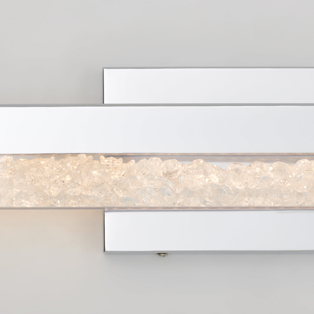 The Artika Riviera modern LED bathroom vanity light features a white metal frame and clear crystals—ideal for luxury bathroom lighting.