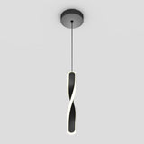A modern, black pendant light with a twisted, looped design hangs from a round ceiling mount, featuring a glowing white edge on a plain gray background.