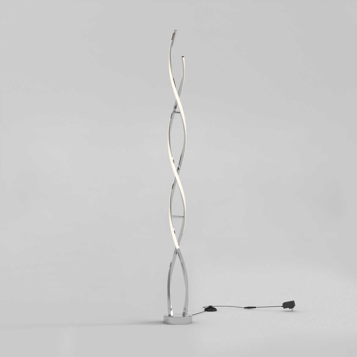 The Artika Swirl modern LED floor lamp features three intertwining curved light strips on a round base with a black power cord and switch, shown against a plain light gray background.