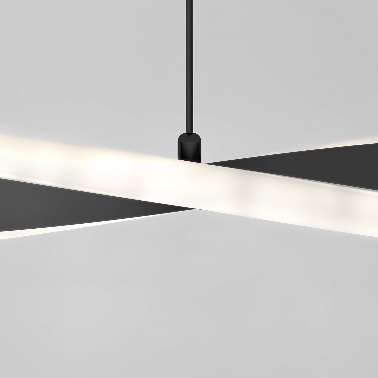 The Artika Finley Linear LED pendant light 3 CCT features two intersecting, sleek black-and-white bars suspended by a black cord against a light gray backdrop, creating a modern, minimalist geometric design.