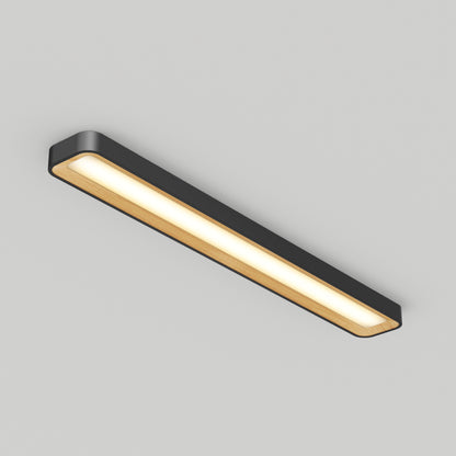 The Artika Alton 48 in. LED flush mount light features a modern rectangular design with a black frame, wood accent, and selectable warm white illumination, shown installed on a plain light gray ceiling.