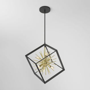 The Artika Nebula 6-light pendant features a black open cube frame with a gold starburst centerpiece, suspended from a black ceiling mount against a plain white background.