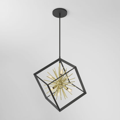 The Artika Nebula 6-light pendant features a black open cube frame with a gold starburst centerpiece, suspended from a black ceiling mount against a plain white background.