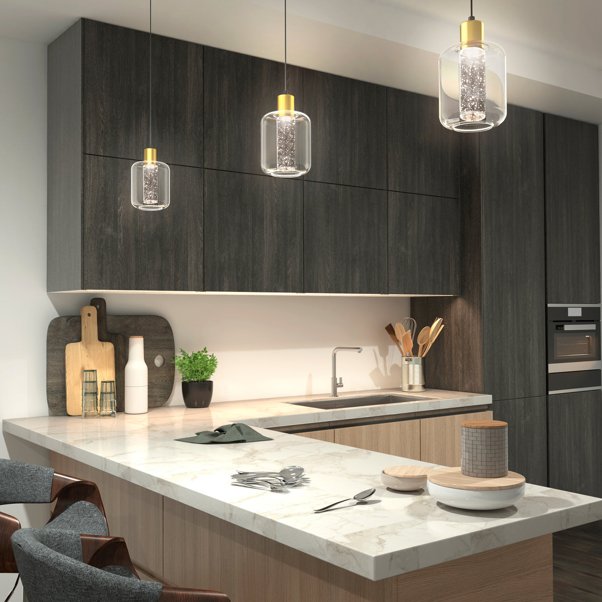 Modern kitchen features dark wood cabinets, a marble island with two chairs, and various items like cutting boards, utensils, plants, and plates. Three Artika Champagne Globe modern LED pendant lights hang above the island.