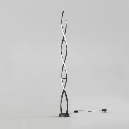 Artika Swirl modern LED floor lamp with black and white intertwined strips, ideal for stylish living room lighting.