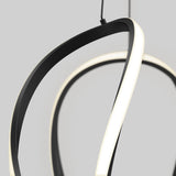 Close-up of a modern, minimalist pendant light featuring two intertwined, curved LED strips with black exteriors and glowing white interiors, set against a plain light gray background.