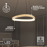 Modern pendant light with a black and painted wood finish, shown hanging above a dining area. Features include adjustable height, integrated LED (no bulbs required), and a 3-year warranty.