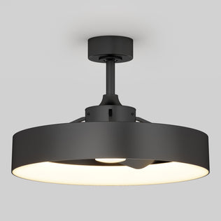 The Artika Austin 23 in. LED modern ceiling fan features a circular black metal frame, a wide flat diffuser for soft, warm light, and comes with a remote—shown mounted on a short stem against a plain light gray background.