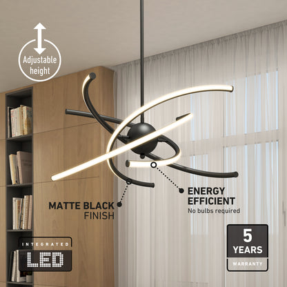 Modern black LED chandelier with curved light bars hangs from the ceiling in a living room with large windows and bookshelves. Text highlights adjustable height, matte black finish, energy efficiency, and 5-year warranty.