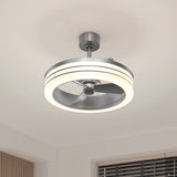 A modern ceiling fan with integrated circular LED light, metallic finish, and three blades mounted on a white ceiling above a window with horizontal blinds.