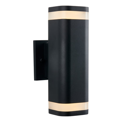 The Artika Mettle LED indoor-outdoor wall light features a modern black, elongated cylindrical design on a rectangular base, emitting diffused light both up and down through frosted end bands.