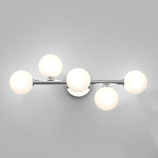 The Artika Bloom 27-in (69 cm) 3-Light Modern LED Vanity Light adds elegant style to your bathroom with frosted glass globes on a sleek metal bar, ideal for modern spaces and light gray backgrounds.