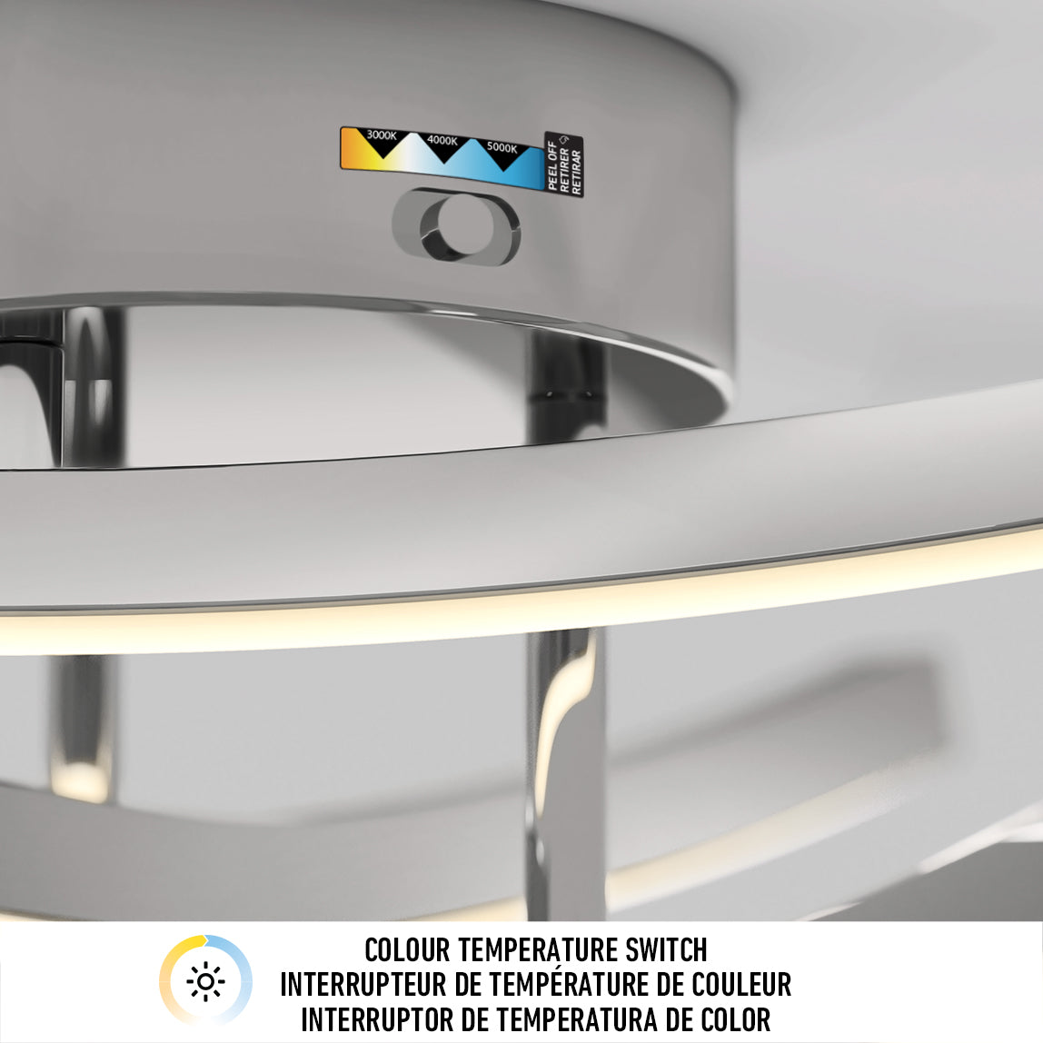 Close-up of a modern light fixture with a colour temperature switch above the light, showing multiple settings. A label below reads Colour Temperature Switch in English, French, and Spanish.