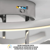 Close-up of a modern light fixture with a colour temperature switch above the light, showing multiple settings. A label below reads Colour Temperature Switch in English, French, and Spanish.