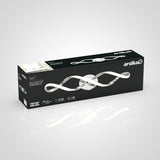 A black rectangular box displays the Artika Swift LED ceiling light fixture with a modern, twisted design. Product details and branding are visible on the packaging.