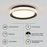Modern ceiling light fixture with a crystal-like rim, glowing warmly. Icons highlight features: LED integrated, dimmable, 1900 lumens, 50,000 hours lifespan, easy installation, and selectable white technology.