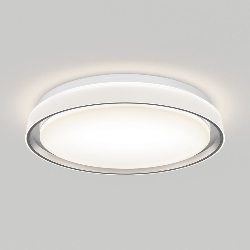 The Artika Niko 15.5 in. modern LED flush mount light features a circular white design with a glowing center, seamlessly mounted on a smooth, light gray ceiling and offering 5 selectable color temperatures.