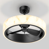 A modern ceiling fan with three black blades, encased in a circular, marble-patterned light fixture, mounted on a white ceiling.