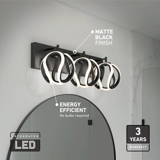 The Artika Vivaldi LED contemporary bathroom vanity light 3 CCT features a matte black finish with three integrated LED lights. This energy-efficient fixture complements modern décor and includes a 3-year warranty.