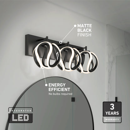 The Artika Vivaldi LED contemporary bathroom vanity light features three circular integrated LED fixtures, a matte black finish, adjustable 3 CCT color temps, energy efficiency, a 3-year warranty, and requires no bulbs—perfect for mounting above your mirror.