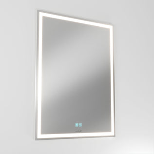 The Artika Aurea 24″x31″ Anti-Fog LED Bathroom Mirror with touch controls is mounted on a plain white wall.