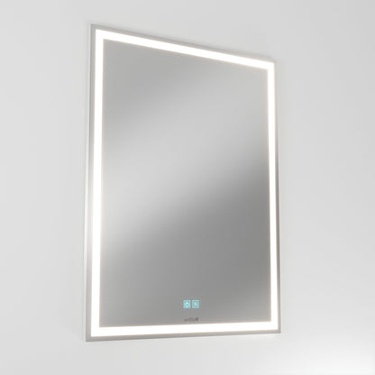The Artika Aurea 24″x31″ Anti-Fog LED Bathroom Mirror with touch controls is mounted on a plain white wall.