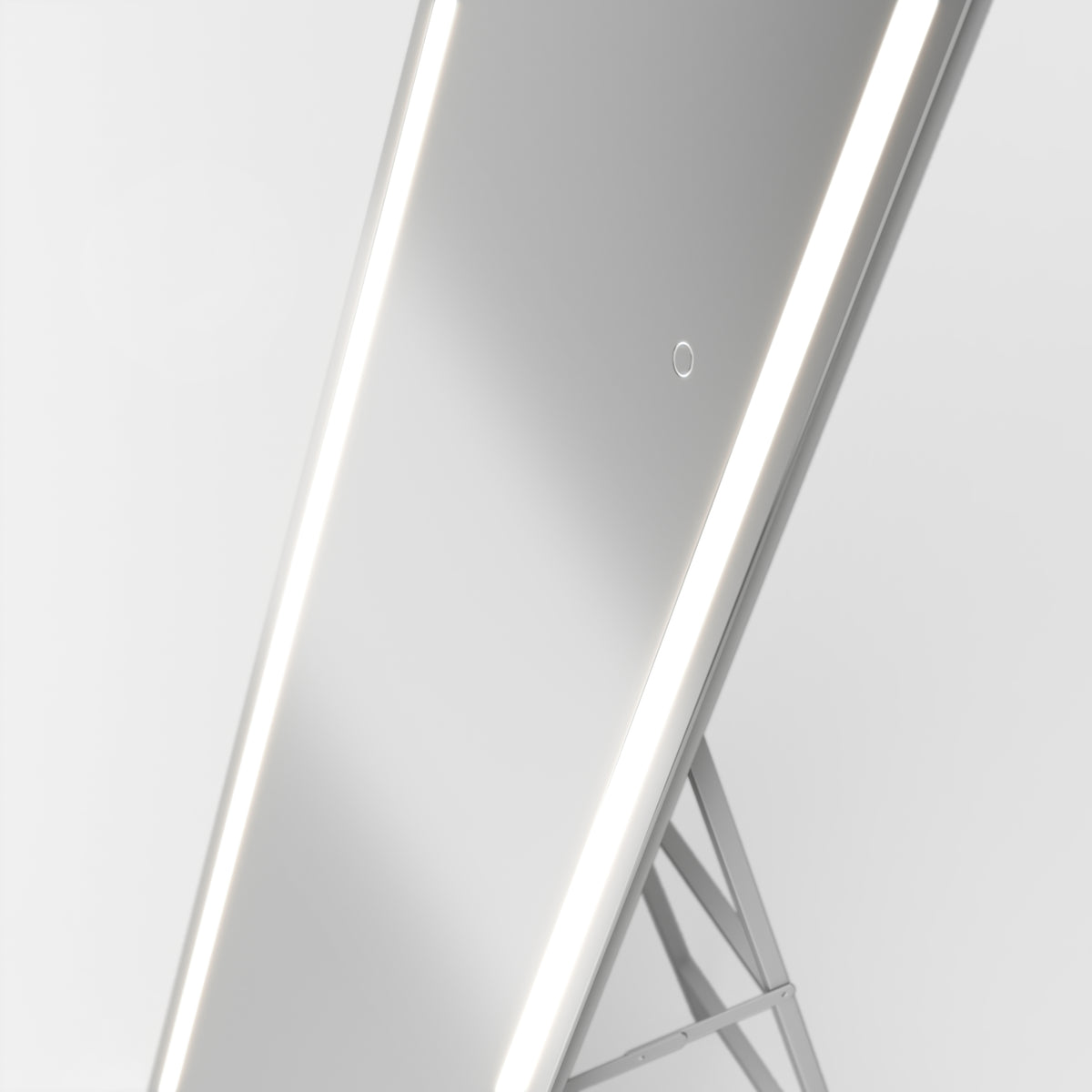 A sleek, modern full-length mirror with LED light strips along its sides, standing on a minimalistic metal frame against a plain white background.