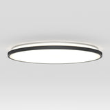 A modern, circular ceiling light fixture with a black outer ring and a glowing white center, mounted on a plain white ceiling.