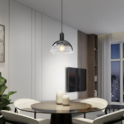 A modern dining area with a round table, four white chairs, two vases, a wall-mounted TV, large windows, neutral-tone decor, and the Artika Nella Pendant without Bulbs hanging overhead.