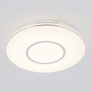 The Artika Horizon 13 in. LED flush mount light features a dimmable glowing white center and silver ring, mounting elegantly on ceilings.