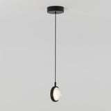 A modern pendant light with a black circular mount and cord, featuring a round, textured glass lampshade hanging from the ceiling against a plain white background.