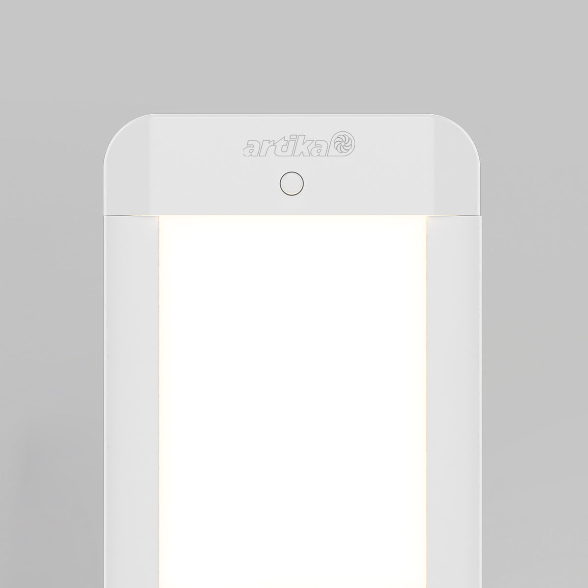 The Artika Maestro under cabinet LED light 3CCT, a modern rectangular fixture with rounded edges, is illuminated against a plain gray background. The Artika brand name appears at the top center above the light panel.
