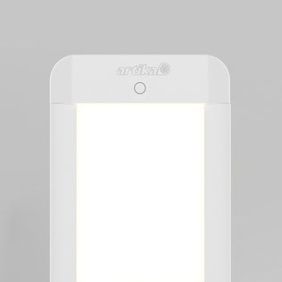 The Artika Maestro under cabinet LED light 3CCT, a modern rectangular fixture with rounded edges, is illuminated against a plain gray background. The Artika brand name appears at the top center above the light panel.