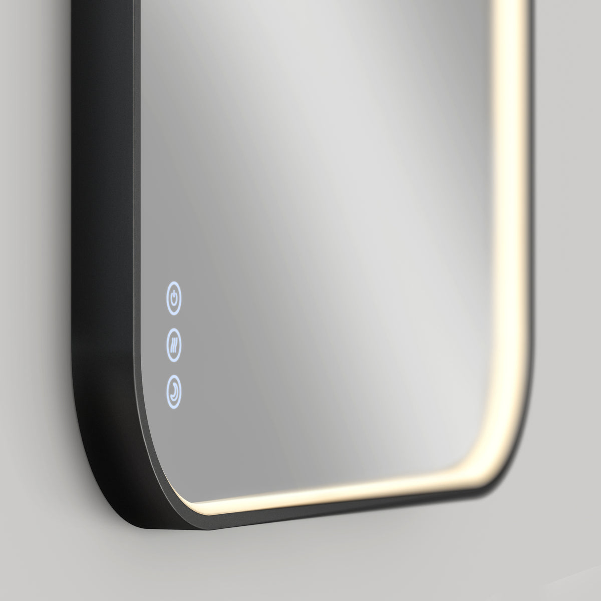 A close-up of a modern rectangular smart mirror with rounded corners, illuminated by built-in LED lights along the edge and touch-sensitive control icons on the lower left corner.